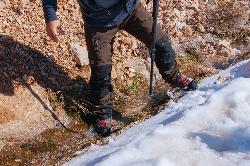 man wearing mountain/ hiking trouser