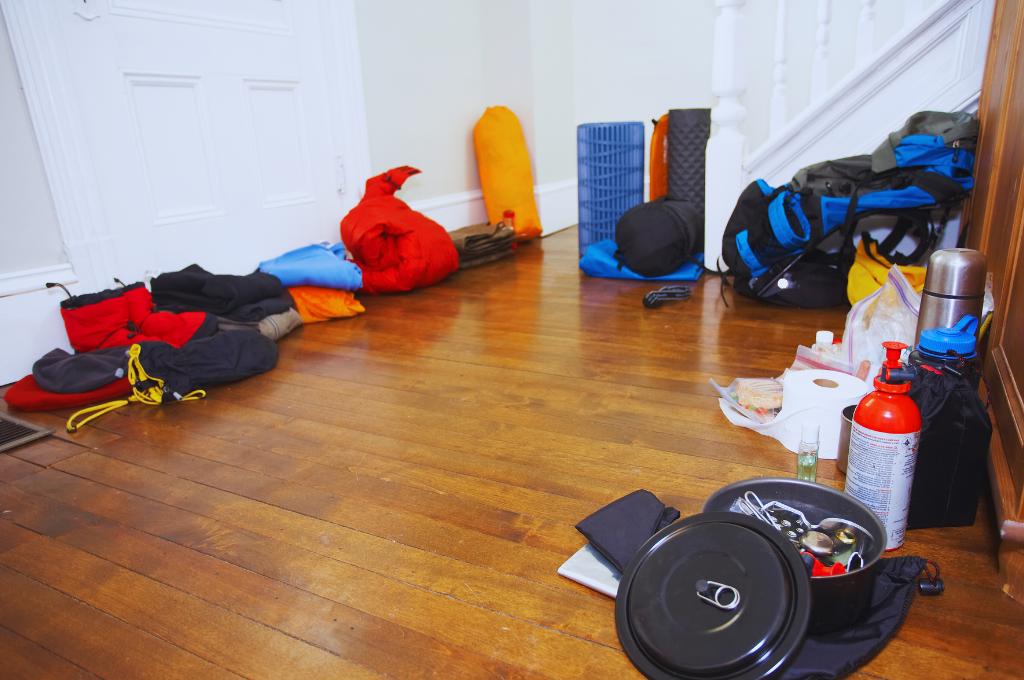 winter camping equipment on the home floor